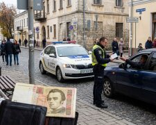 Кам'янець-Подільський поліція патрульна машина водій конфлікт капот