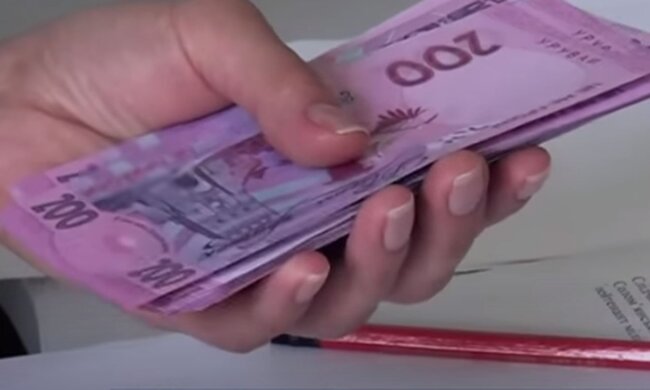 Деньги. Фото: скриншот YouTube-видео