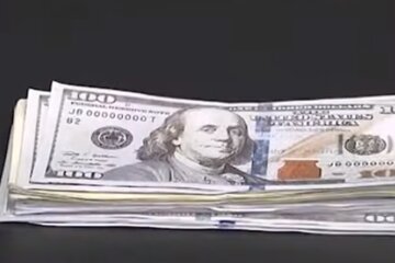 Доллары. Фото: скриншот YouTube-видео