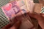 Деньги. Фото: скриншот YouTube-видео