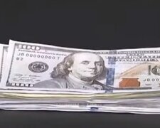 Долар. Фото: скріншот YouTube-відео
