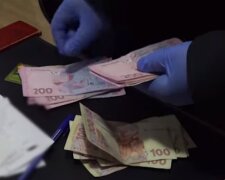 В Киеве начальника банка поймали на хищении средств клиентов. Фото: скриншот YouTube