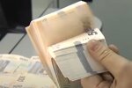 Деньги. Фото: скриншот YouTube-видео