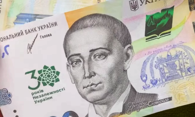 В Раде приняли новые правила выплат военным и их семьям. Фото: YouTube