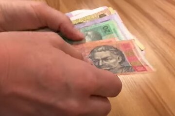 Деньги. Фото: скриншот YouTube-видео