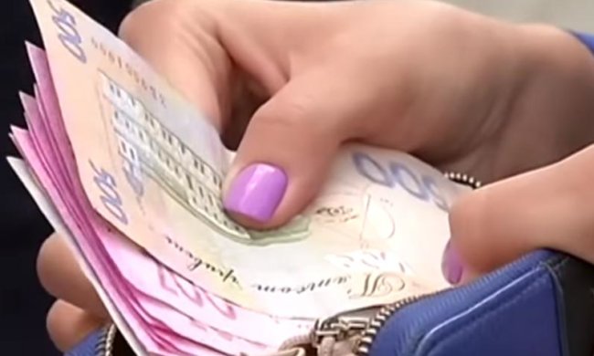 Налог, деньги, гривна. Фото: скрин youtube