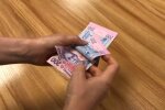 Деньги. Фото: скриншот YouTube-видео