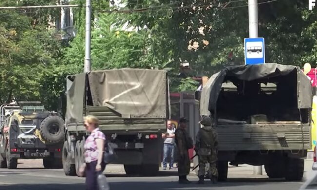 Оккупанты в Херсоне. Фото: скриншот YouTube-видео