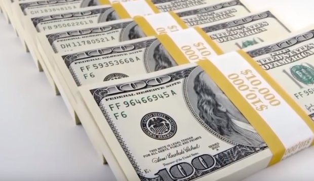 Доллары. Фото: youtube