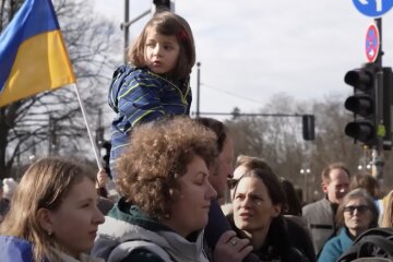 Украинские беженцы, скриншот из YouTube