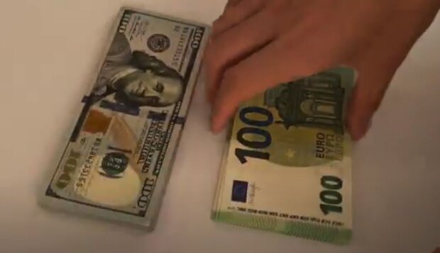 Долар та євро. Фото: скріншот YouTube-відео