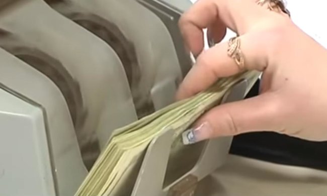 Курс доллара. Фото: скрин видео Факты