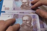 Деньги.  Фото: скриншот YouTube-видео