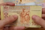 Деньги.  Фото: скриншот YouTube-видео