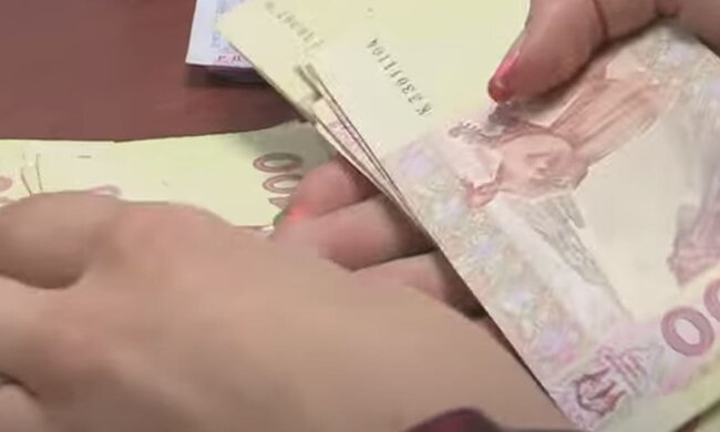 Деньги. Фото: скриншот YouTube-видео