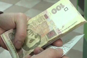 Деньги. Фото: скриншот YouTube-видео