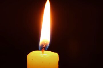 Свеча памяти. Фото: YouTube, скрин