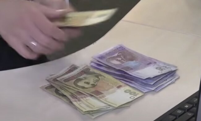 Деньги. Фото: скриншот YouTube-видео
