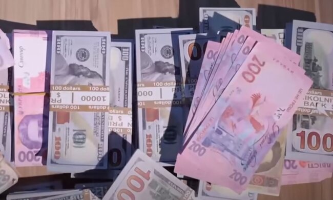 Деньги. Фото: скриншот YouTube-видео