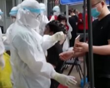 Коронавирус в Китае. Фото: скриншот YouTube
