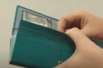 Кошелек. Фото: скриншот YouTube-видео
