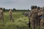 Женщина в ВСУ. Фото: скриншот YouTube-видео