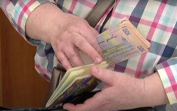 Деньги. Фото: скриншот YouTube-видео
