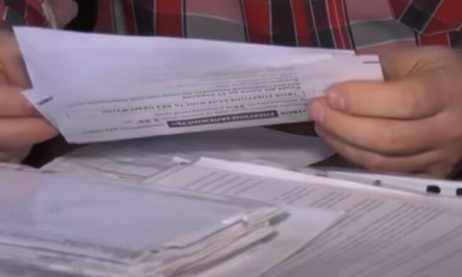 Комунальні платежі. Фото: скріншот YouTube-відео