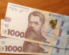 Банкноти у 1000 гривень. Фото: скріншот YouTube-відео