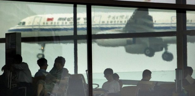 Пассажиры в китайском аэропорту