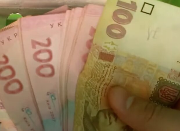 Деньги. Фото: скриншот YouTube