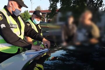 Сотрудники патрульной полиции. Фото: скриншот YouTube-видео