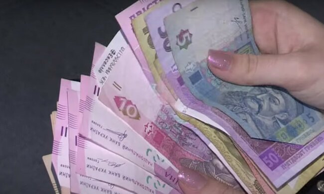 Деньги. Фото: скриншот YouTube-видео