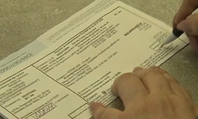 Платіжки за комуналку. Фото: скріншот YouTube