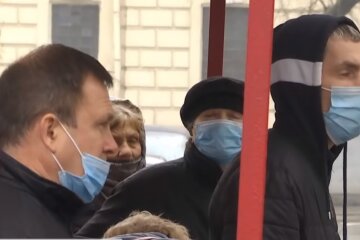 Украинцы в масках. Фото: Youtube