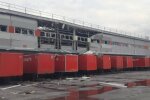 Последствия атаки россиян на терминал Новой почты в Днепре