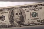 Доллары США. Фото: скриншот Youtube-видео