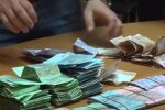 Деньги. Фото: скриншот YouTube-видео
