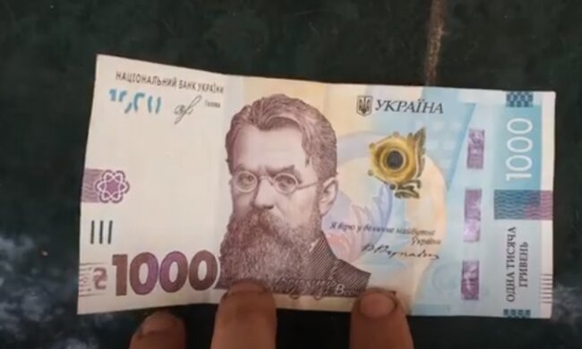 Купюра в 1000 грн. Фото: скріншот YouTube-відео
