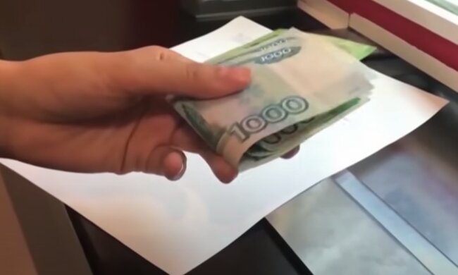 Рублі. Фото: скріншот YouTube-відео