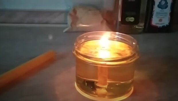 Свічка. Фото: YouTube, скрін