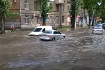 Ливень. Фото: скриншот YouTube-видео