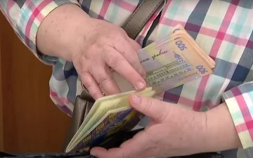 Деньги. Фото: скриншот YouTube-видео