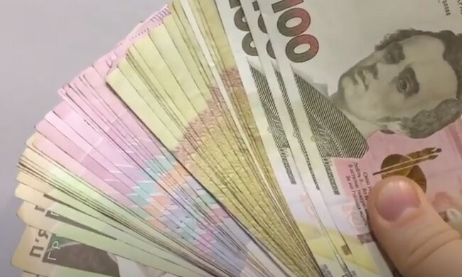 Деньги. Фото: скриншот YouTube-видео