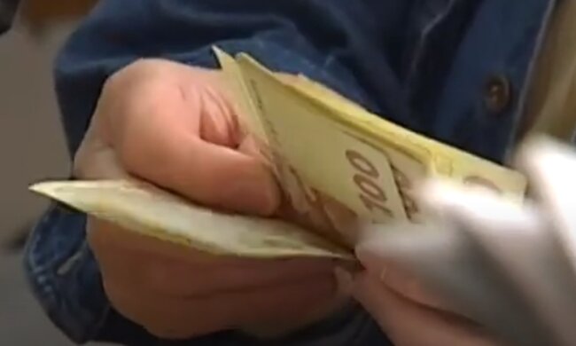 Деньги. Фото: скриншот YouTube-видео
