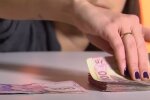 Деньги. Фото: скриншот YouTube-видео