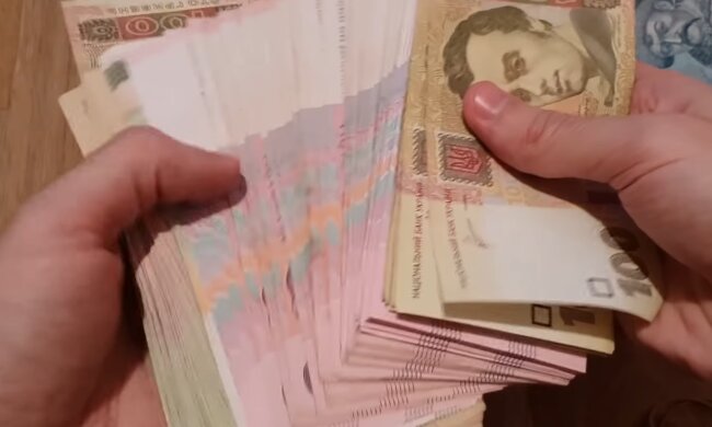 Деньги. Фото: скриншот YouTube-видео