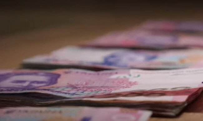 Деньги. Фото: скриншот YouTube-видео