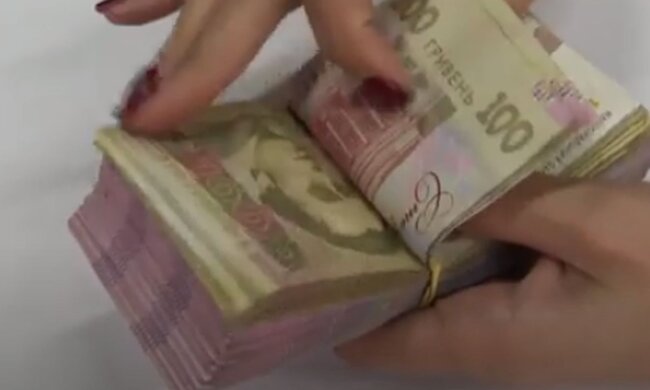 Деньги. Фото: скриншот YouTube-видео