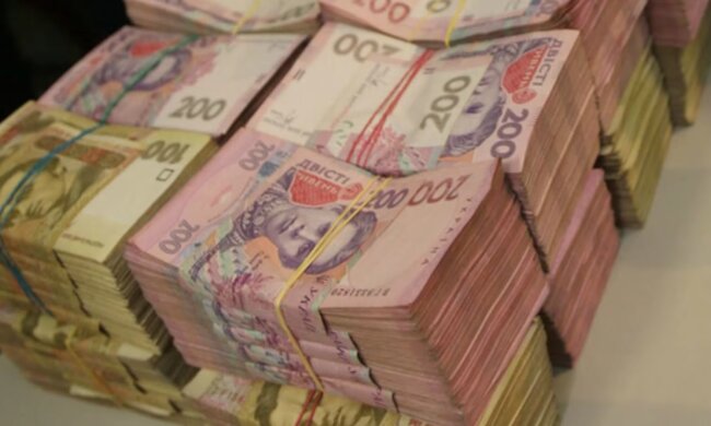 Деньги.  Фото: скриншот YouTube-видео